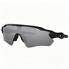 Gray cycling sunglasses with a black frame shown from the side.