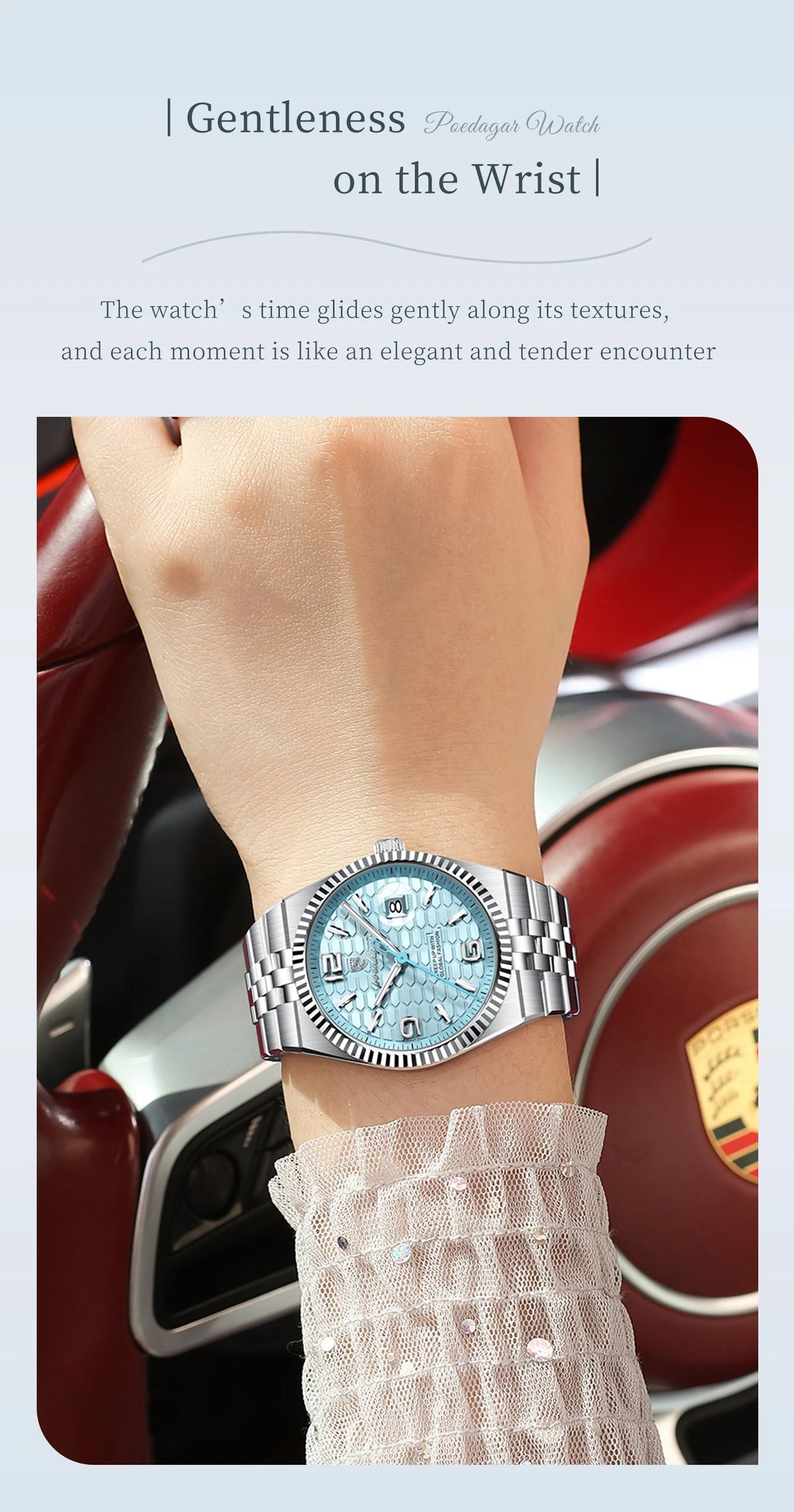 A close-up of a silver quartz watch with a blue dial and luminous features worn on a wrist.