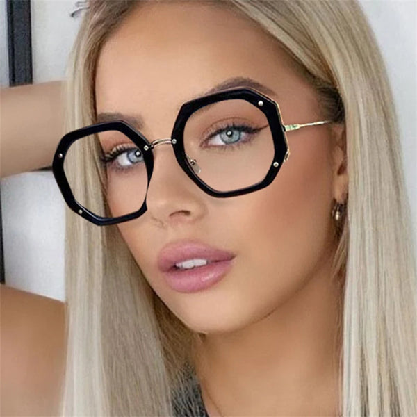 Close-up of a woman wearing black hexagonal anti-blue light eyeglasses frame.