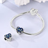 Sterling silver devil's eye charm bracelet with heart and star charms