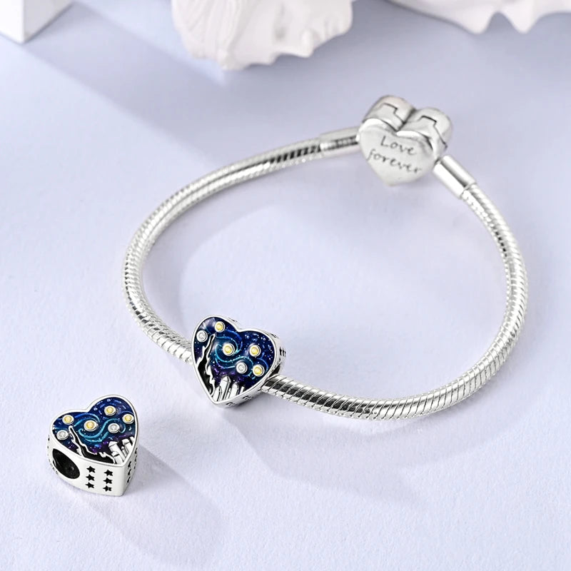 Sterling silver devil's eye charm bracelet with heart and star charms