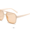 Seitenansicht von Vintage-Pilot-Sonnenbrillen mit doppelter Brücke in hellem Beige.