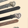 A collection of heart-shaped retro embossed leather belts in various shades of gray and brown.