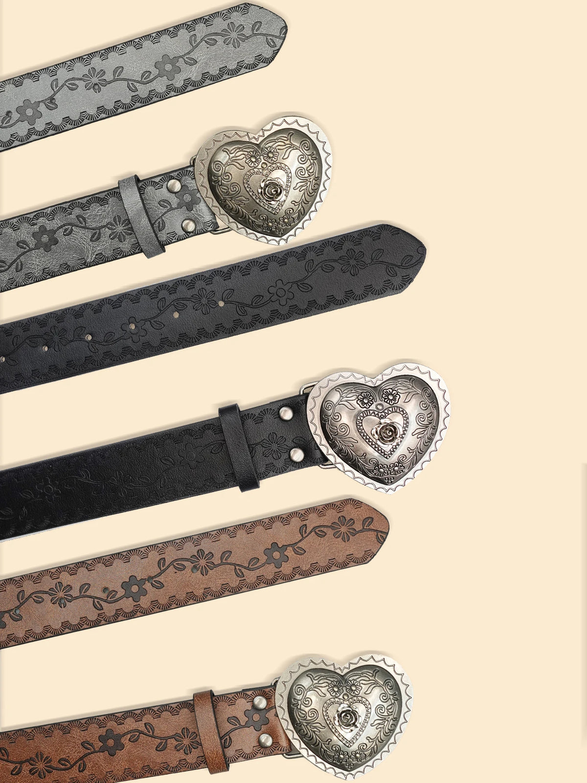 A collection of heart-shaped retro embossed leather belts in various shades of gray and brown.