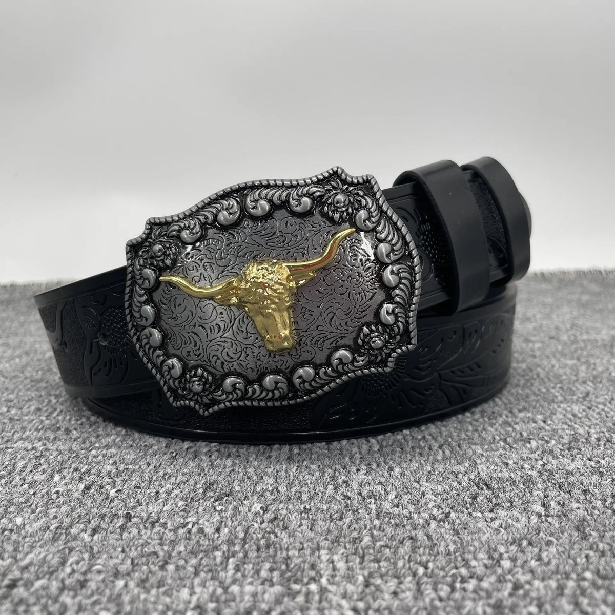 Black vintage western PU leather belt featuring a gold-toned bull buckle.