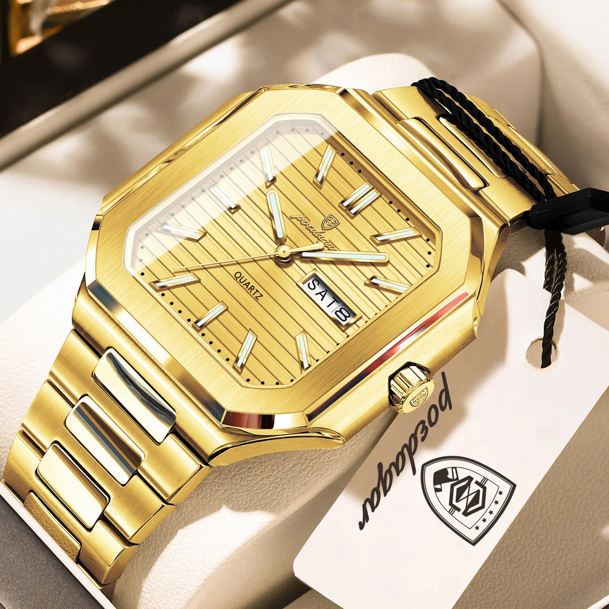 A gold-toned men's watch with a stainless steel bracelet and a light-colored box.
