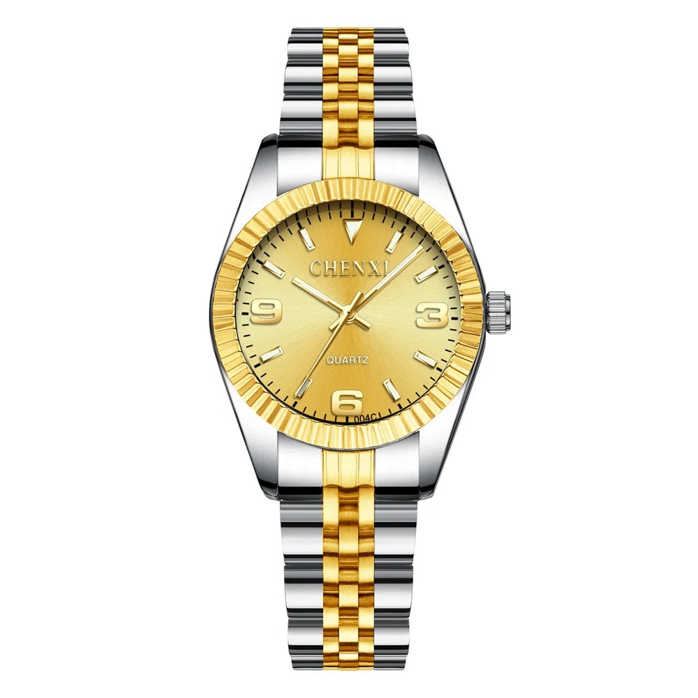 A luxury golden quartz wristwatch with silver and gold tone metal bracelet.