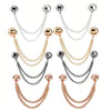 A pair of multi-function magnetic clothing clips in gold and silver tones.