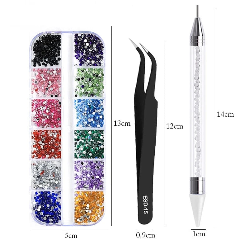 A set of 4 rhinestone nail art decorations in various colors and sizes packaged in a clear tube with an applicator.