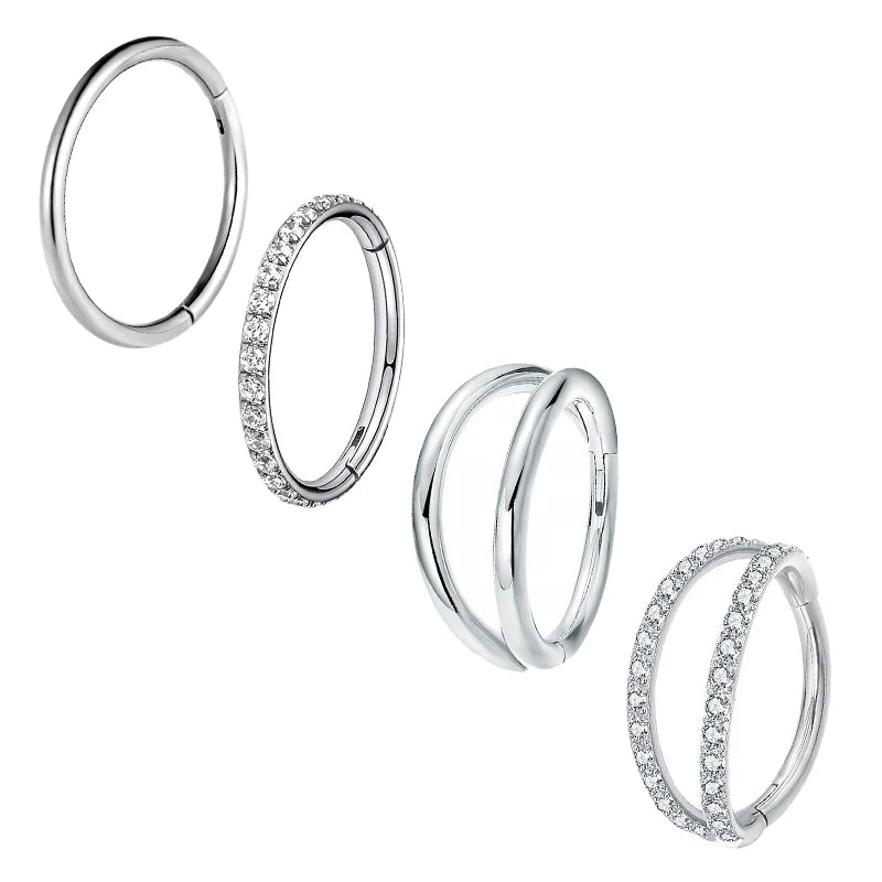 Set aus Edelstahl-CZ-Segment-Ohrringe und Clicker-Nasepiercings.
