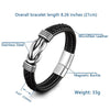 A black microfiber leather bracelet with a stainless steel knot and magnetic buckle.
