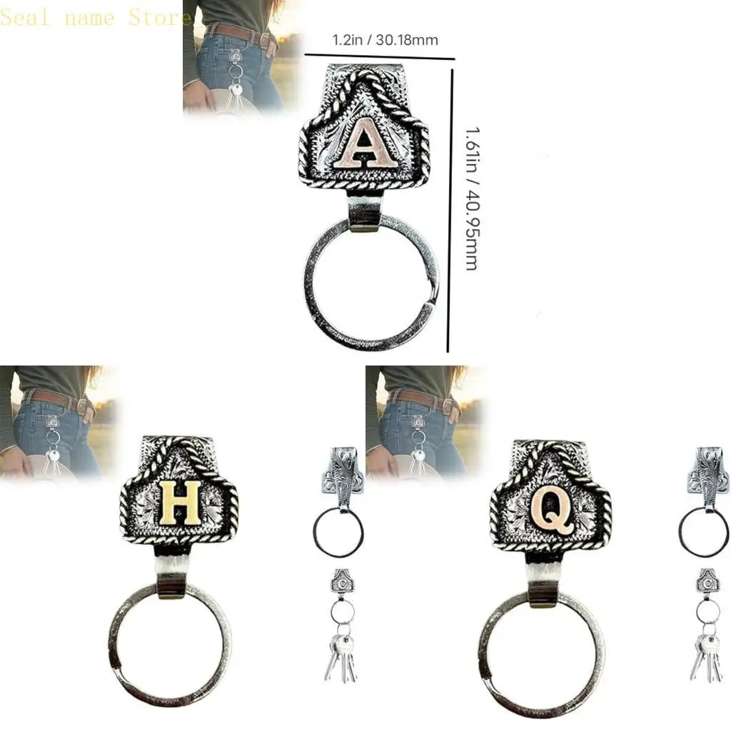 A silver belt keychain featuring a letter design on a metal ring.