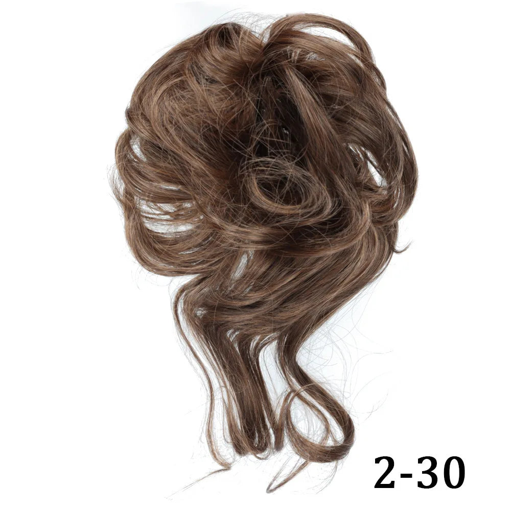 A bundle of messy brown synthetic hair, styled in a loose bun or ponytail.