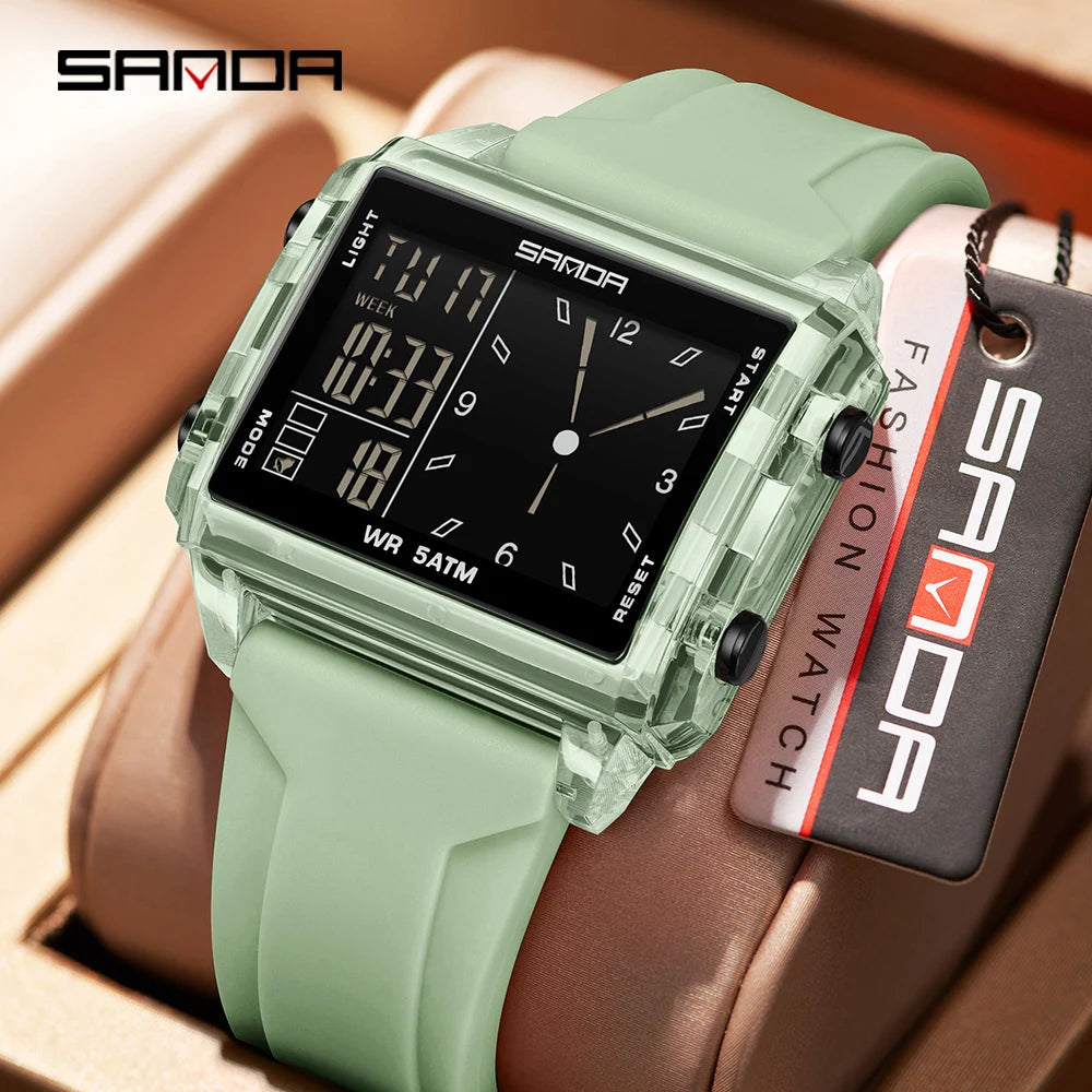 A light green digital wristwatch with a transparent case and a dark face is shown on a brown leather background.