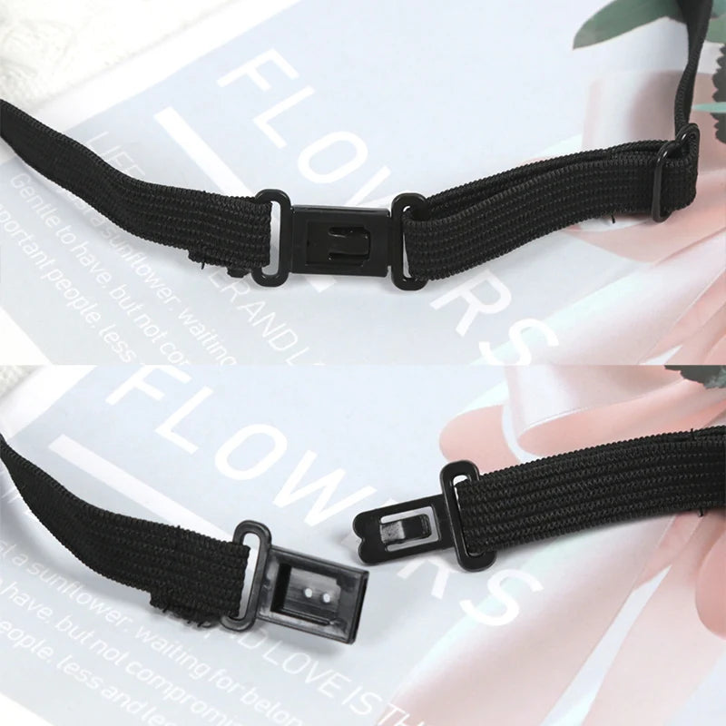 Black fabric neck tie with a rectangular rhinestone pearl clasp shown against a light background.