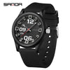 A black classic quartz fashion watch with a silver-toned dial and silicone strap shown against a white background.