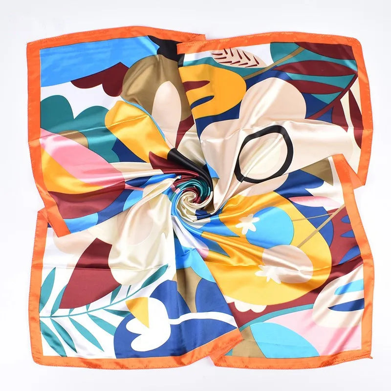 Luxuser Seidenschal mit leuchtendem floralem und abstraktem Muster in Orange, Pink, Gelb, Blau und Braun