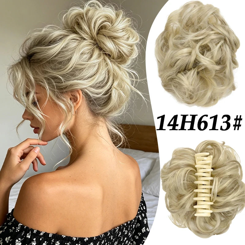 A woman shows off a voluminous curly messy bun hairstyle with light blonde hair, featuring a claw clip accessory.