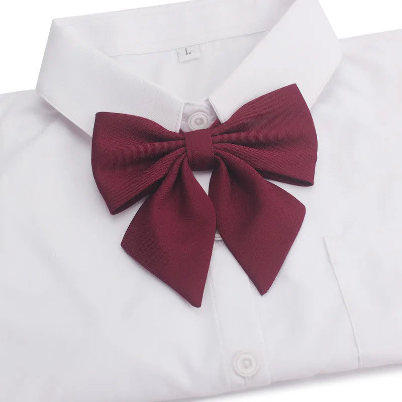 White collared shirt with a maroon butterfly ribbon tie set