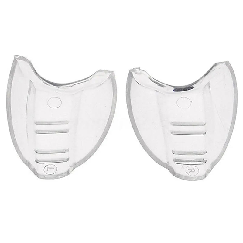 A pair of flexible clear eye shields designed for eyeglasses.