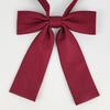 A deep burgundy butterfly ribbon tie set featuring a bow and a long necktie.