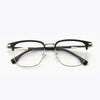 Eine schwarze und goldene Anti-Blaulicht-Lesebrille mit dünnem Rahmen.