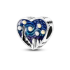 A sterling silver heart-shaped charm bracelet featuring a blue and purple celestial design with sparkling stones.
