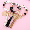 Leopard silicone bead necklace with white and black beads and gold keychains