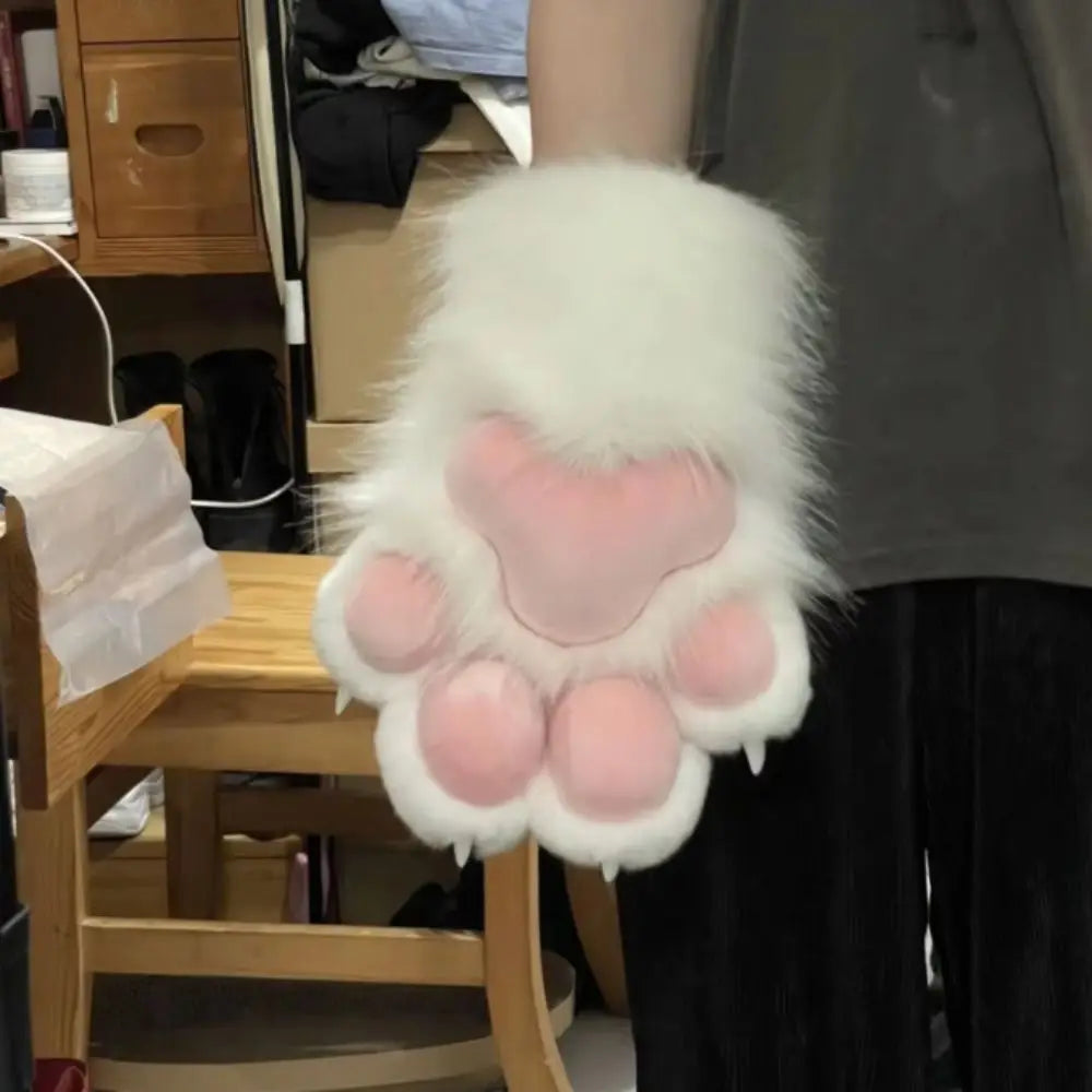 White faux furry gloves shaped like cartoon paws with pink pads