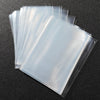 A stack of premium clear card sleeves for sports collectibles, showing various transparent plastic sleeves.