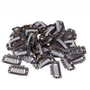 A collection of dark brown hair extension snap clips for wigs.