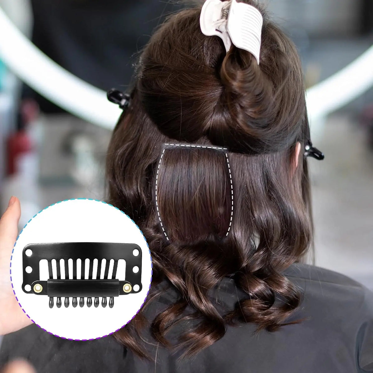 A close-up of dark hair styled in a bun with snap clips, showing the hair extension product.