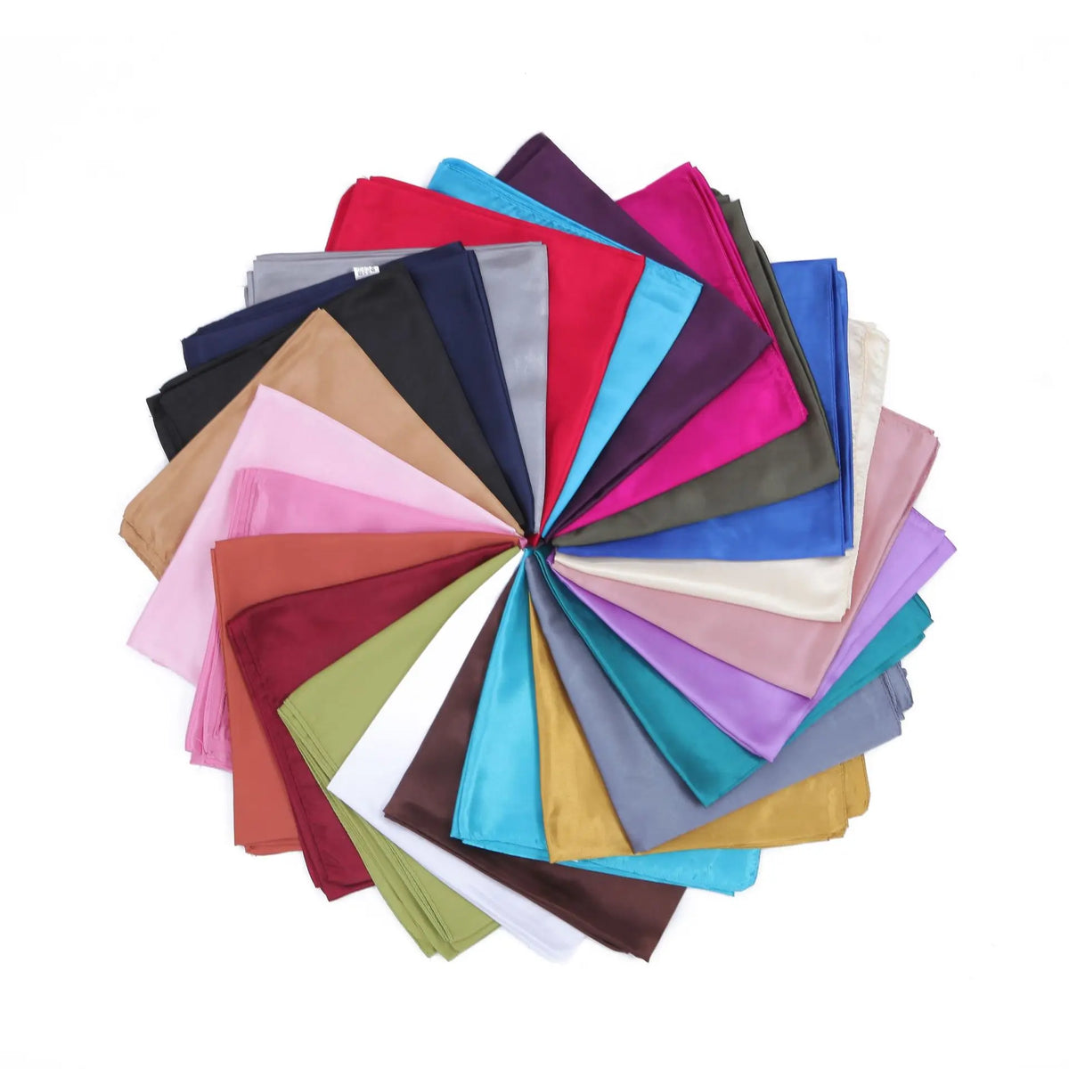 Arreglo de pañuelos de seda satinada de varios colores, incluyendo rosa, rojo, azul, verde y morado.
