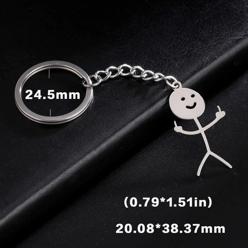 Silver keychain featuring a stickman figure with a middle finger gesture