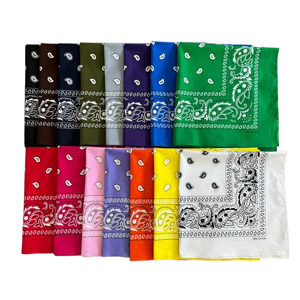 A collection of colorful oversized cotton bandana scarves featuring paisley and intricate prints.