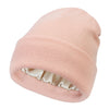 A light pink satin-lined knitted beanie hat shown from the side.