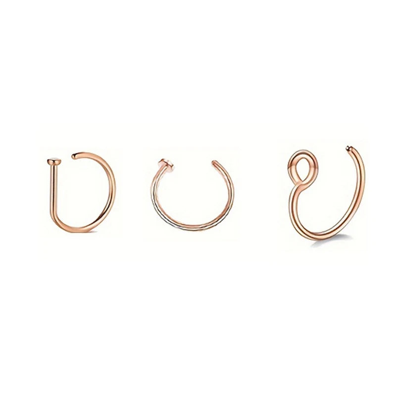 Three gold-toned magnetic stainless steel septum rings displayed individually.