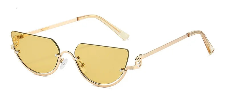 Gafas estilo ojo de gato retro doradas con lentes amarillos y armazones delgados dorados