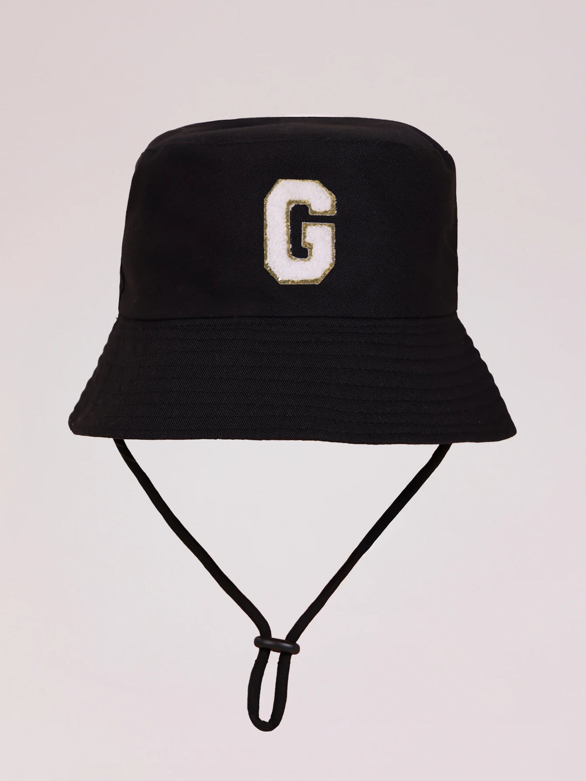 Black sun hat with a gold letter G print and an adjustable cord