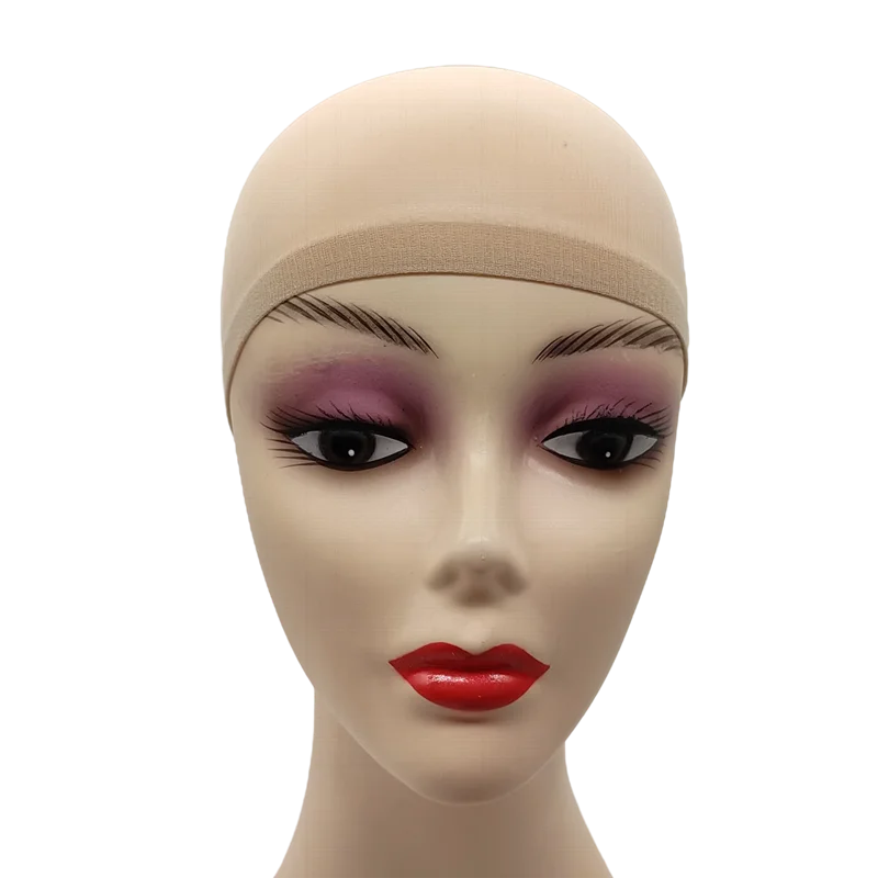 A mannequin head wearing a beige stretch mesh wig net cap with purple eyeshadow and red lipstick.