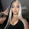 A model wearing a straight lace front wig with black and white highlights, looking directly at the camera.