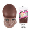 A brown wig cap is shown on a mannequin head, packaged with instructions.