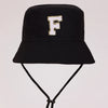 Black sun hat with a gold letter F embroidered on the front and an adjustable cord.
