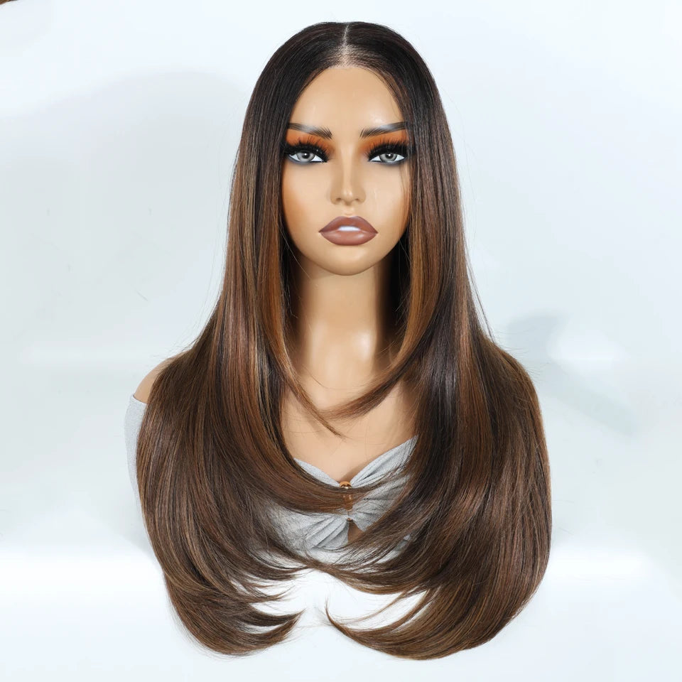 A model wears a long, straight brown wig with subtle layering and lace front.