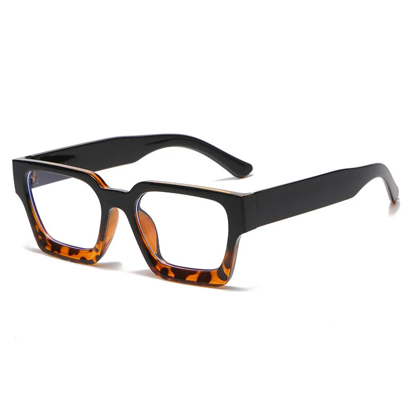 A pair of black square anti-blue light computer glasses with amber tortoise shell frames.