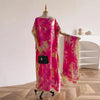 A mannequin displays a vibrant pink floral butterfly peacock cape shawl draped over a garment.
