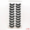 A display of dramatic mink false eyelashes arranged in rows on a white background.