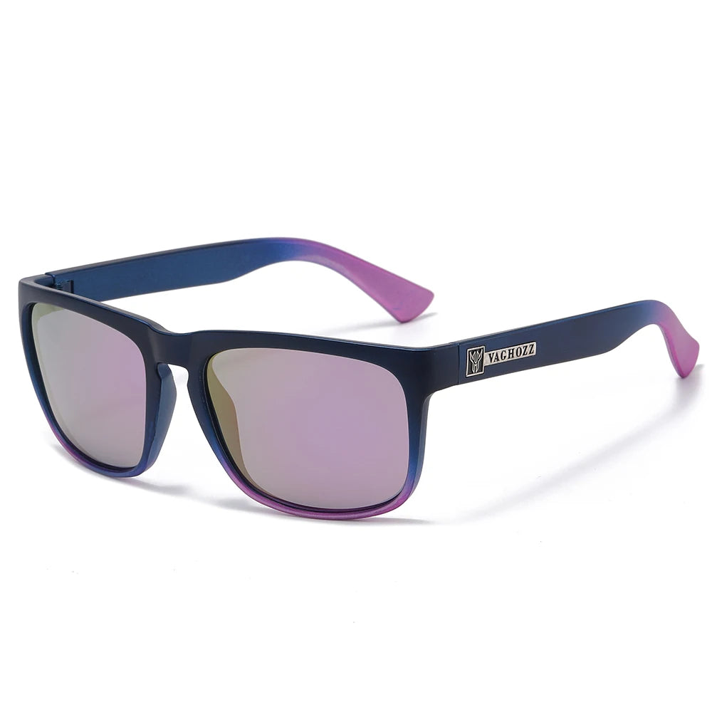 Lunettes de soleil polarisées violettes et bleues avec une monture sombre et des verres teintés.