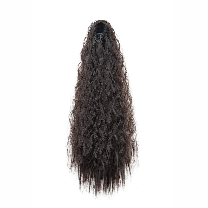 A long, dark brown kinky curly ponytail hair extension with a clip-in visible against a white background.