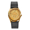 A vintage irregular quartz watch with a gold-toned face and a black leather strap.